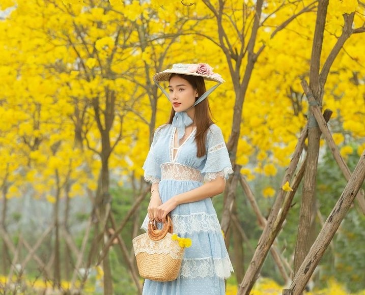 Timeless Rebellion: The Enduring Legacy of Coco Chanel woman, model, park, trees, leaves, foliage, flora, style, fashion, nature, yellow