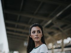 From Desk to Dinner: Mastering Effortless Day-to-Night Style Transitions woman standing in front of train