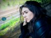 Carry Confidence: A Real-World Guide to Everyday Bags That Work as Hard as You Do woman sitting outdoor during daytime