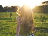Curated Closets: Building Wardrobe Essentials Around Your Lifestyle woman walking on lawn with trees