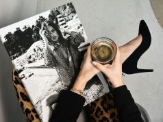 Awakening the Future: A Sneak Peek into Spring/Summer 2025 Fashion Trends woman holding clear glass candle holder and grayscale portrait of a woman